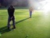 Andy putts towards the light of god. (God is a scratch golfer)