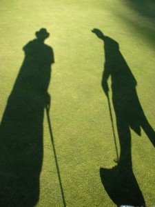 My shadow is great at golf.